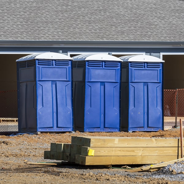 what is the cost difference between standard and deluxe porta potty rentals in Berne Indiana